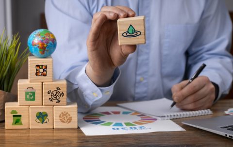 front-view-man-with-wooden-blocks